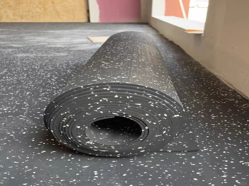 engineer analyzing rubber flooring data